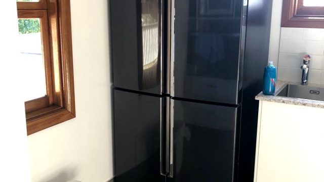 Upstairs Large Fridge In Kitchen